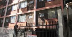 Bachelor apartment for rent in Pretoria Central, featuring a separate bedroom and lounge area. Close to all amenities